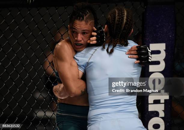 Roxanne Modafferi pushes Sijara Eubanks up against the cage during the filming of The Ultimate Fighter: A New World Champion at the UFC TUF Gym on...