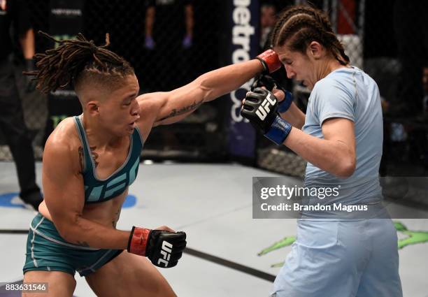 Sijara Eubanks punches Roxanne Modafferi during the filming of The Ultimate Fighter: A New World Champion at the UFC TUF Gym on August 18, 2017 in...