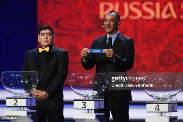 Draw assistant, Cafu draws Denmark during the Final Draw for the 2018 FIFA World Cup Russia at the State Kremlin Palace on December 1, 2017 in...