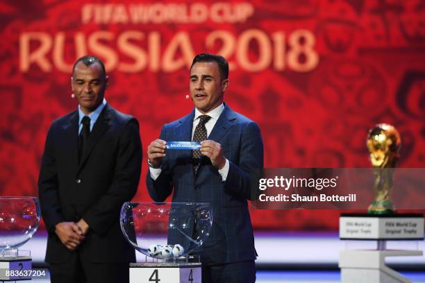 Draw assistant, Fabio Cannavaro draws Saudi Arabia during the Final Draw for the 2018 FIFA World Cup Russia at the State Kremlin Palace on December...