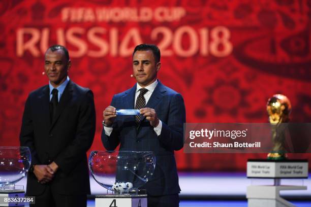 Draw assistant, Fabio Cannavaro draws Australia during the Final Draw for the 2018 FIFA World Cup Russia at the State Kremlin Palace on December 1,...