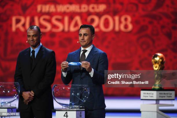 Draw assistant, Fabio Cannavaro draws Japan during the Final Draw for the 2018 FIFA World Cup Russia at the State Kremlin Palace on December 1, 2017...