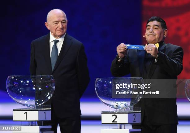 Draw assistant, Diego Maradona draws Croatia during the Final Draw for the 2018 FIFA World Cup Russia at the State Kremlin Palace on December 1, 2017...