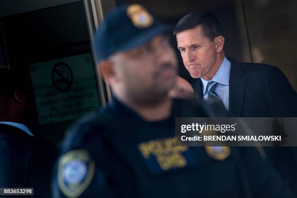 Gen. Michael Flynn, former national security adviser to US President Donald Trump, leaves Federal Court December 1, 2017 in Washington, DC. Donald...