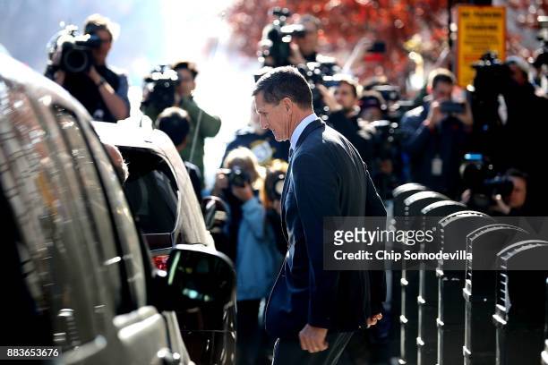 Michael Flynn, former national security advisor to President Donald Trump, leaves following his plea hearing at the Prettyman Federal Courthouse...
