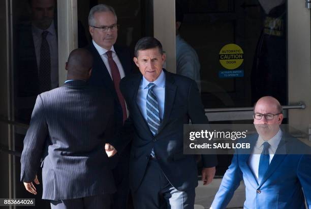 Gen. Michael Flynn, former national security adviser to US President Donald Trump, leaves Federal Court in Washington, DC, December 1, 2017. Donald...