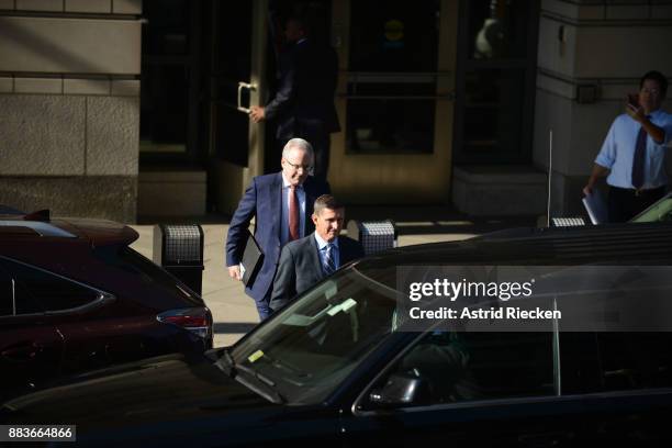 Michael Flynn, former national security advisor to President Donald Trump, leaves following his plea hearing at the Prettyman Federal Courthouse...