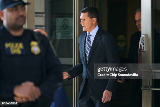 Michael Flynn, former national security advisor to President Donald Trump, leaves following his plea hearing at the Prettyman Federal Courthouse...