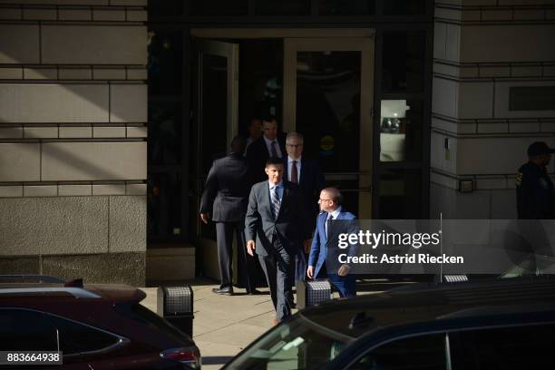 Michael Flynn, former national security advisor to President Donald Trump, leaves following his plea hearing at the Prettyman Federal Courthouse...