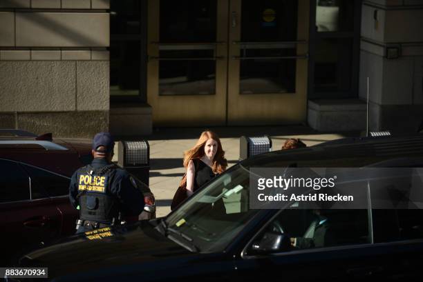 An unknown person enters the car awaiting Michael Flynn following his plea hearing at the Prettyman Federal Courthouse December 1, 2017 in...