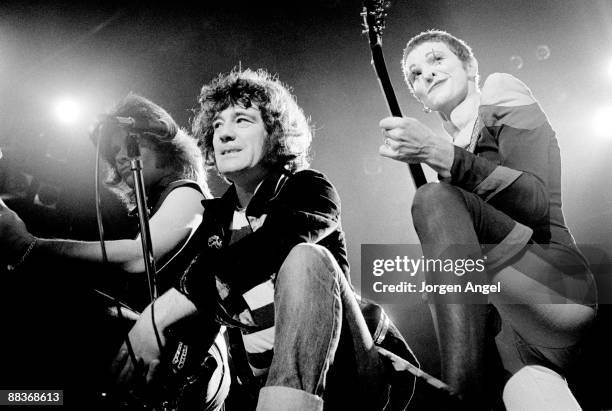 Chris Glen, Alex Harvey and Zal Cleminson perform on stage with the Sensational Alex Harvey Band in 1975 in Copenhagen, Denmark.