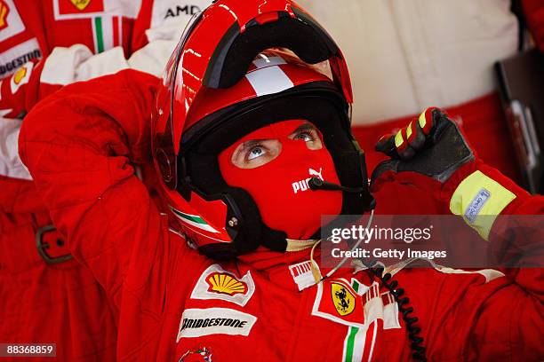 Ferrari mechanic at work during the Turkish Formula One Grand Prix at Istanbul Park on June 7 in Istanbul, Turkey.