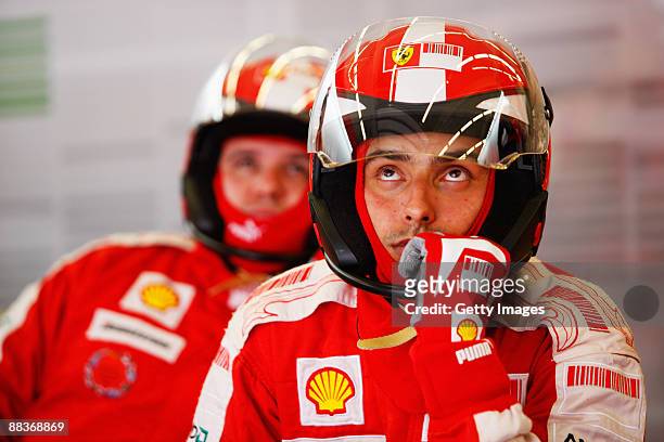 Ferrari mechanics at work during the Turkish Formula One Grand Prix at Istanbul Park on June 7 in Istanbul, Turkey.