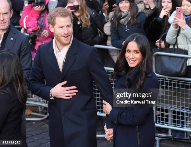 Prince Harry and fiancee Meghan Markle attend the Terrence Higgins Trust World AIDS Day charity fair at Nottingham Contemporary on December 1, 2017...