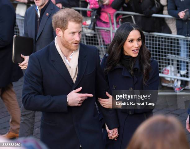 Prince Harry and fiancee Meghan Markle attend the Terrence Higgins Trust World AIDS Day charity fair at Nottingham Contemporary on December 1, 2017...