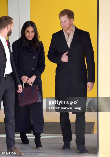 Prince Harry and fiancee Meghan Markle attend the Terrence Higgins Trust World AIDS Day charity fair at Nottingham Contemporary on December 1, 2017...