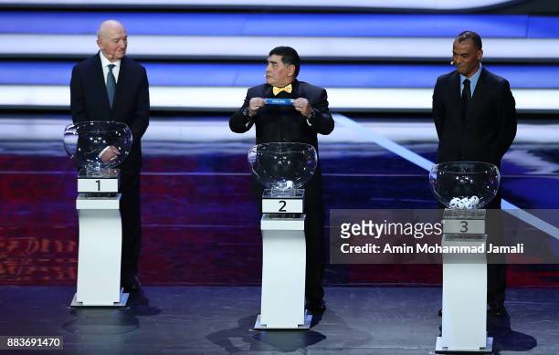 Draw assistant, Diego Maradona draws Mexico during the Final Draw for the 2018 FIFA World Cup Russia at the State Kremlin Palace on December 1, 2017...