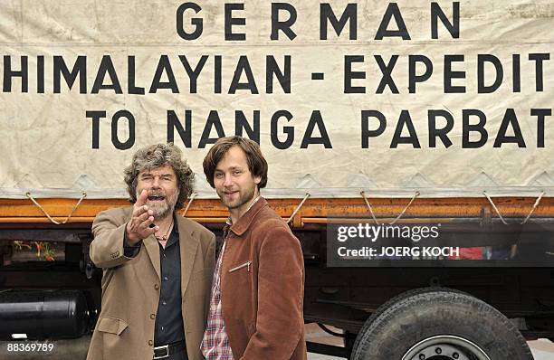 Italian mountain climber Reinhold Messner and the German actor Florian Stetter pose during the shooting of the film "Nanga Parbat" in Munich,...