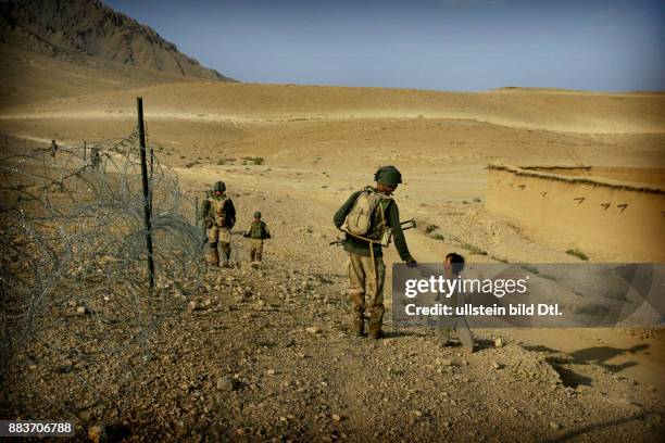 During patrols of the Dutch ISAF forces, the soldiers try to win the hearts and minds of the local population.