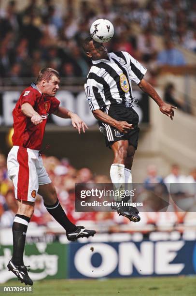 Manchester United defender Gary Pallister challenges Newcastle United striker Les Ferdinand during the 1996 FA Charity match at Wembley Stadium on...