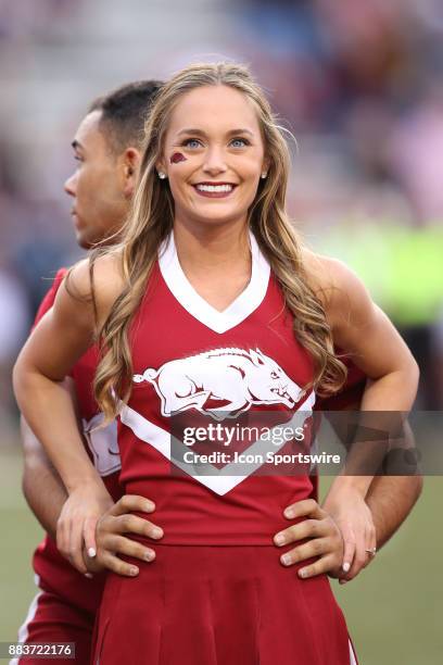 Razorback cheerleader entertains the crowd during the game between the Missouri Tigers and the Arkansas Razorbacks on November 24th, 2017 at Donald...