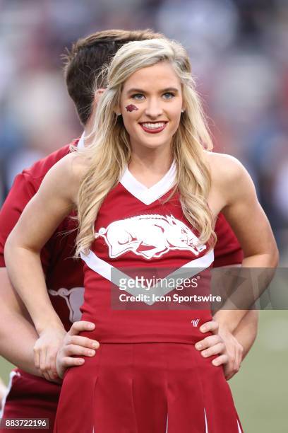 Razorback cheerleader entertains the crowd during the game between the Missouri Tigers and the Arkansas Razorbacks on November 24th, 2017 at Donald...