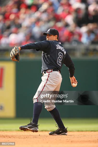 Second baseman Kelly Johnson of the Atlanta Braves throws to first base during a game against the Philadelphia Phillies at Citizens Bank Park on...