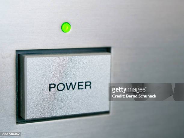 power button - bernd schunack stock pictures, royalty-free photos & images
