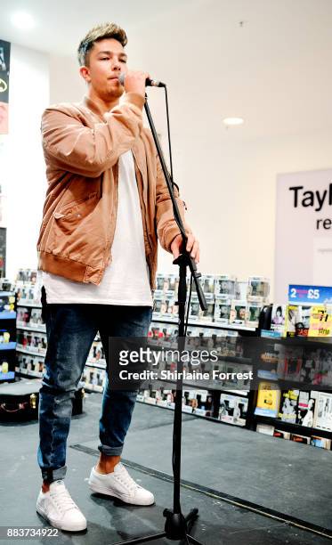 Matt Terry performs live and signs copies of his debut album 'Trouble' for fans at HMV Manchester on November 29, 2017 in Manchester, England.