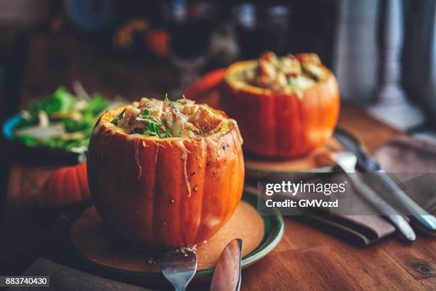 pumpkin risotto baked with cheese in a pumpkin - abóbora menina cucúrbita imagens e fotografias de stock