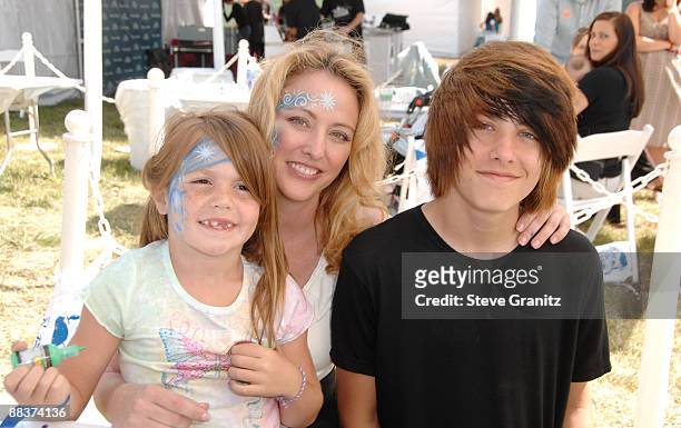 Virginia Madsen and children attends the A Time for Heroes Celebrity Carnival Sponsored by Disney, benefiting the Elizabeth Glaser Pediatric AIDS...