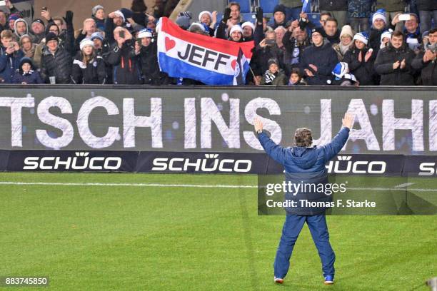 Coach Jeff Saibene of Bielefeld celebrates with his supporters after the Second Bundesliga match between DSC Arminia Bielefeld and FC St. Pauli at...