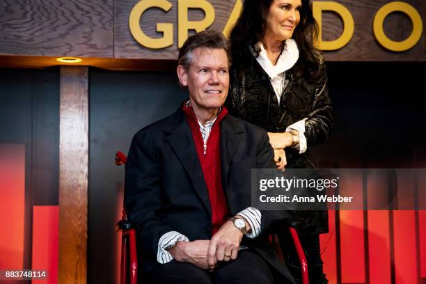 Randy Travis and wife Mary Travis attend the Randy Travis Wax Figure Unveiling At Madame Tussauds Nashville at Madame Tussauds Nashville on December...