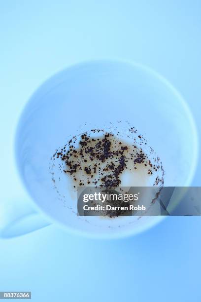 empty tea cup showing tea leaves at bottom - 8897 stock pictures, royalty-free photos & images