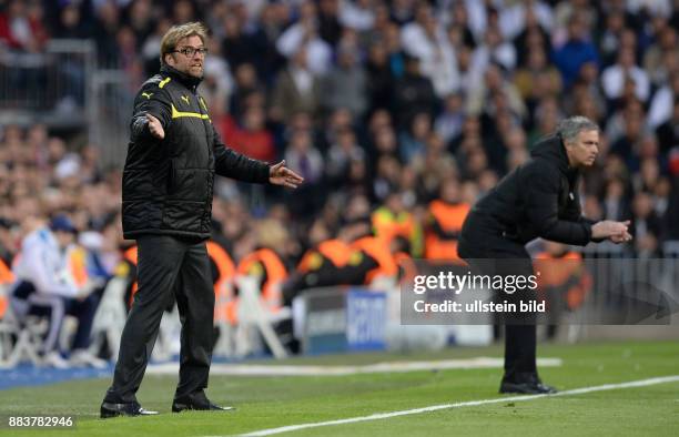 Real Madrid - Borussia Dortmund Emotional an der Seitenlinie: Trainer Juergen Klopp und Trainer Jose Mourinho