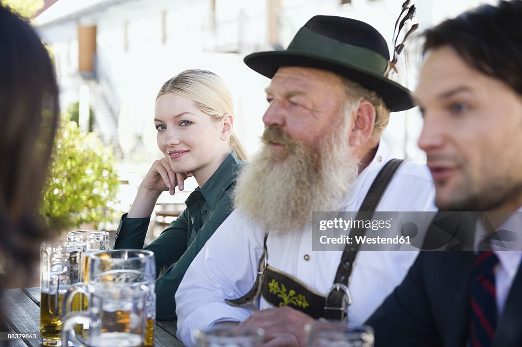 Germany, Bavaria, Upper Bavaria, People in beer garden