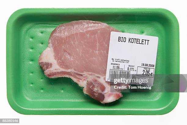raw porkchop in styrofoam box, elevated view - meat packaging imagens e fotografias de stock