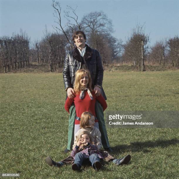 French actor Claude Rich with his wife and two daughters at home, 5th March 1969