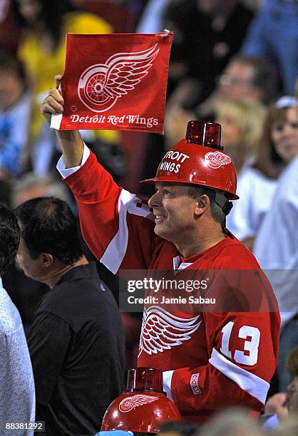 Detroit fan cheers before the Detroit Red Wings face the Pittsburgh Penguins during Game Six of the NHL Stanley Cup Finals at the Mellon Arena on...