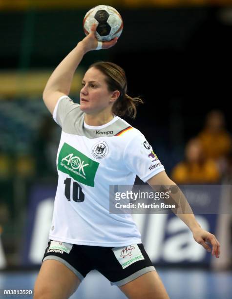 Anna Loerper of Germany controls the ball during the IHF Women's Handball World Championship group D match between Germany and Cameroon at Arena...