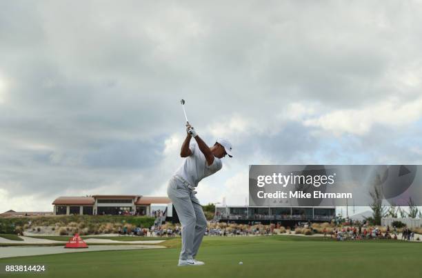 Tiger Woods of the United States plays a shot on the 18th hole during the second round of the Hero World Challenge at Albany, Bahamas on December 1,...