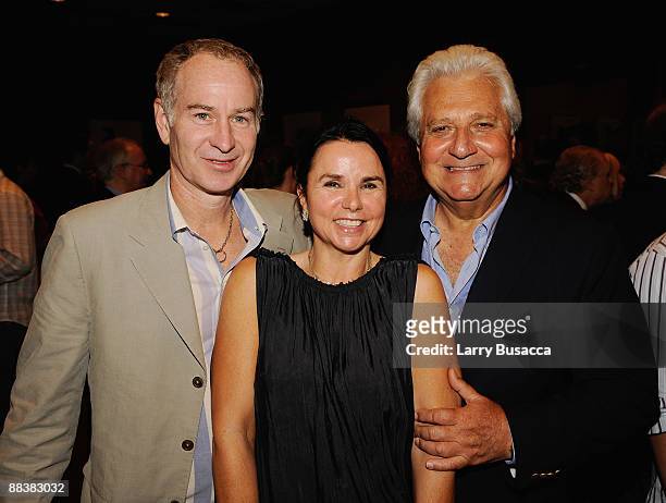 Tennis player John McEnroe, Musician Patty Smyth and Chairman and CEO Of Sony/ATV Music Publishing LLC Martin Bandier attend the cocktail reception...