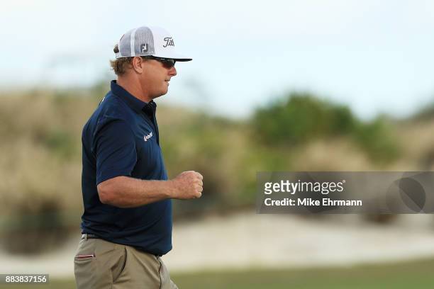 Charley Hoffman of the United States reacts to his birdie on the 18th green during the second round of the Hero World Challenge at Albany, Bahamas on...