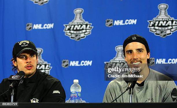 Sidney Crosby and Marc-Andre Fleury of the Pittsburgh Penguins speaks to the media during a press conference after Game Six of the NHL Stanley Cup...