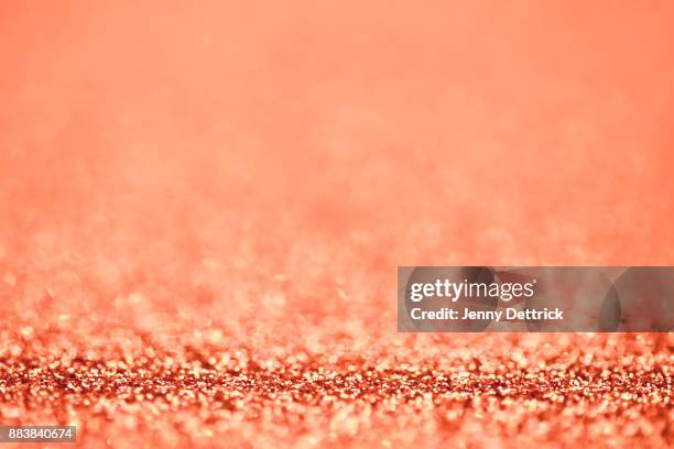 rose-gold glitter background - red gold party stock pictures, royalty-free photos & images