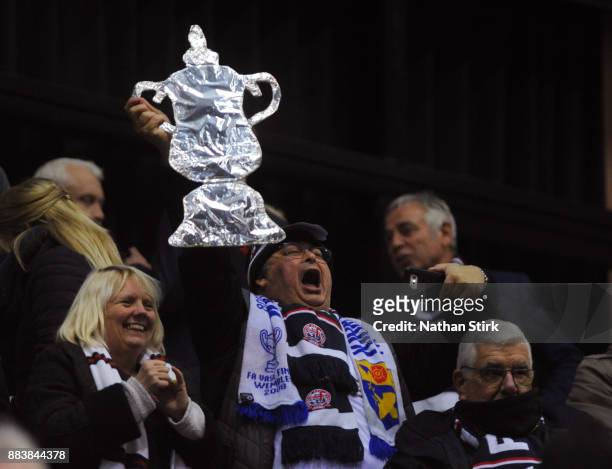 Fylde fan sings during The Emirates FA Cup Second Round match between AFC Fylde and Wigan Athletic on December 1, 2017 in Kirkham, England.