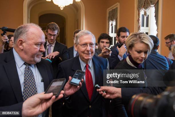Senate Majority Leader Mitch McConnell, R-Ky., walks to the Senate floor after saying to the media that Republicans have enough votes to pass the tax...