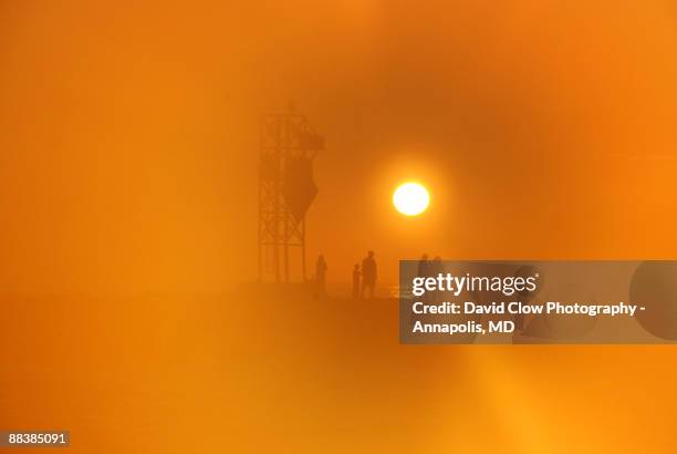 storm break sunrise - ocean city maryland stock-fotos und bilder