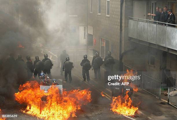 Britain's Prince Charles is given a public order demonstration by riot police of the Territorial Support Group at the Metropolitan Police Specialist...