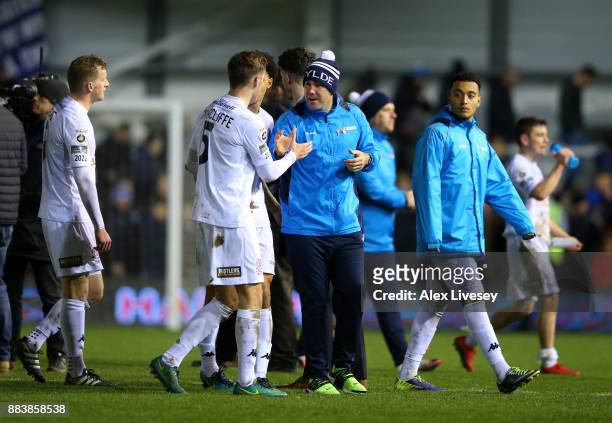 Dave Challinor the manager of AFC Fylde celebrates with Jordan Tunnicliffe after The Emirates FA Cup Second Round between AFC Fylde and Wigan...